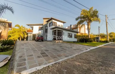 Casa em condomínio fechado com 3 quartos à venda na estrada capitão gentil machado de godoy, 4500, vila elsa, viamão, 204 m2 por r$ 1.300.000