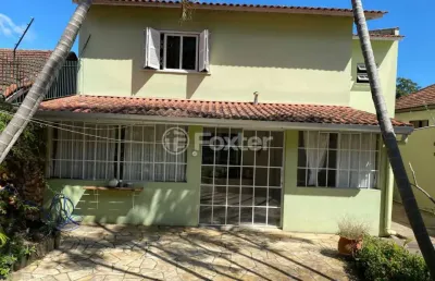 Casa com 3 quartos à venda na rua ibirubá, 94, cavalhada, porto alegre, 277 m2 por r$ 799.999
