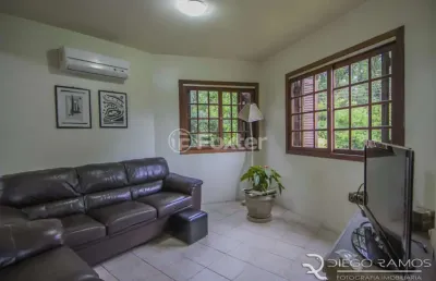 Casa em condomínio fechado com 4 quartos à venda na rua tocantins, 869, lomba do pinheiro, porto alegre, 169 m2 por r$ 750.000