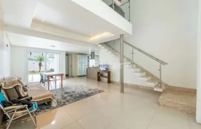 Casa em condomínio fechado com 3 quartos à venda na rua donario neves da silveira, 110, mário quintana, porto alegre, 190 m2 por r$ 890.000