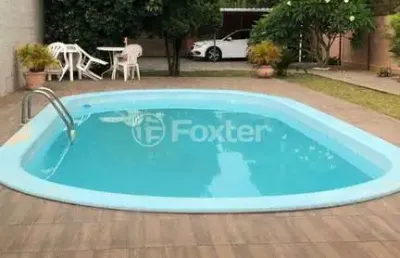 Casa com 3 quartos à venda na rua tamoio, 3091, niterói, canoas, 106 m2 por r$ 695.000