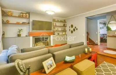 Casa em condomínio fechado com 3 quartos à venda na rua professor carlos de paula couto, 500, cavalhada, porto alegre por r$ 1.300.000