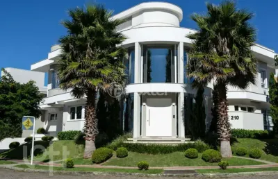Casa com 4 quartos à venda na avenida dos dourados, 210, jurerê internacional, florianópolis, 429 m2 por r$ 8.200.000