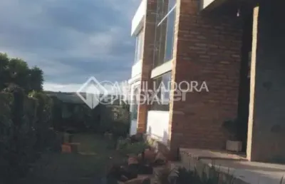 Casa com 3 quartos à venda na rua amapá, 1600, vila nova, porto alegre, 312 m2 por r$ 950.000