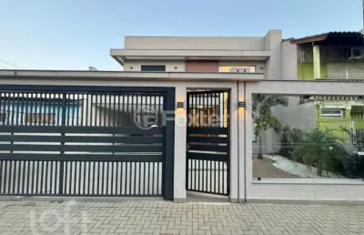 Casa com 3 quartos à venda na rua machado de assis, 280, harmonia, canoas, 205 m2 por r$ 1.170.000