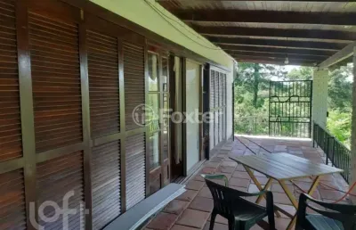 Casa com 3 quartos à venda na estrada kanazawa, 1045, vila nova, porto alegre, 269 m2 por r$ 3.900.000