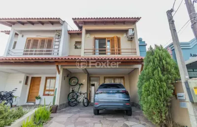 Casa em condomínio fechado com 3 quartos à venda na rua guatambu, 37, hípica, porto alegre, 108 m2 por r$ 580.000