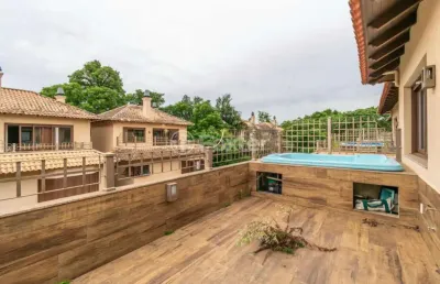 Casa em condomínio fechado com 3 quartos à venda na avenida otto niemeyer, 77, tristeza, porto alegre, 299 m2 por r$ 1.750.000