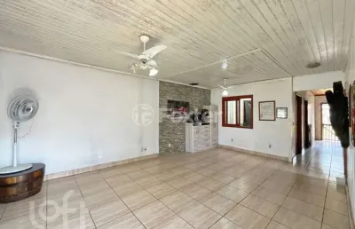 Casa com 2 quartos à venda na rua jerolomo minuzo, 349, vila nova, porto alegre, 107 m2 por r$ 500.000
