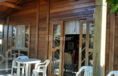 Casa com 4 quartos à venda na avenida astrogildo quadros, 106, pinheira, palhoça, 70 m2 por r$ 695.000