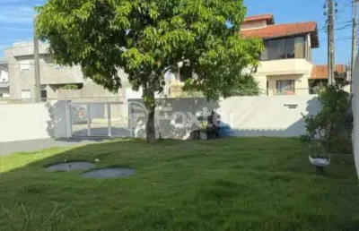 Casa com 3 quartos à venda na rua ipê rosa, 529, carianos, florianópolis, 140 m2 por r$ 1.400.000