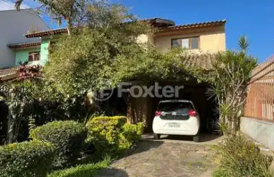 Casa em condomínio fechado com 3 quartos à venda na rua corticeira, 214, hípica, porto alegre, 118 m2 por r$ 599.000