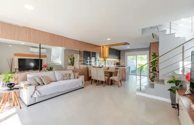 Casa com 3 quartos à venda na rua doutor sérgio de figueiredo, 40, guarujá, porto alegre, 127 m2 por r$ 850.000