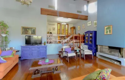 Casa com 3 quartos à venda na rua doutor barbosa gonçalves, 51, chácara das pedras, porto alegre, 344 m2 por r$ 1.394.500