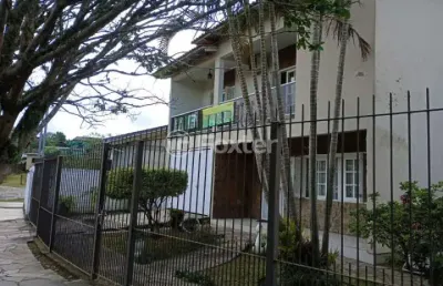 Casa com 3 quartos à venda na rua pinto bandeira, 328, viamópolis, viamão, 625 m2 por r$ 950.000