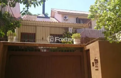 Casa com 3 quartos à venda na rua alcebíades antônio dos santos, 94, nonoai, porto alegre, 317 m2 por r$ 960.000
