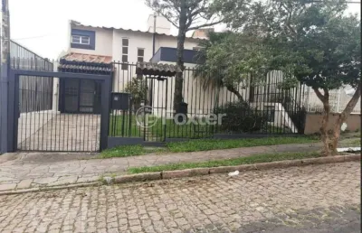 Casa com 3 quartos à venda na rua vital brasil, 210, jardim itu sabará, porto alegre, 100 m2 por r$ 900.000