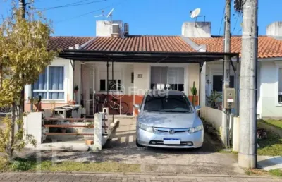 Casa em condomínio fechado com 2 quartos à venda na estrada costa gama, 5124, restinga, porto alegre, 55 m2 por r$ 260.000