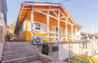 Casa com 3 quartos à venda na rua cachoeira, 54, nonoai, porto alegre, 387 m2 por r$ 450.000