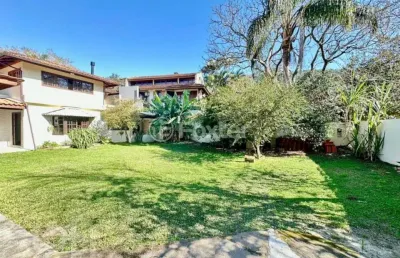 Casa com 4 quartos à venda na rua canto da amizade, 246, lagoa da conceição, florianópolis, 228 m2 por r$ 2.500.000
