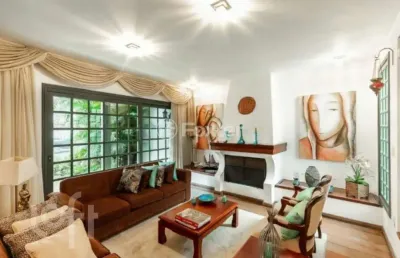 Casa com 3 quartos à venda na rua eudoro berlink, 987, auxiliadora, porto alegre, 239 m2 por r$ 1.990.000