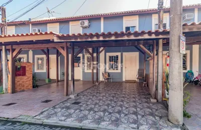 Casa em condomínio fechado com 2 quartos à venda na avenida juca batista, 3621, hípica, porto alegre, 85 m2 por r$ 250.000