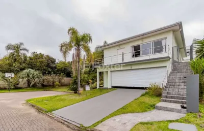 Casa em condomínio fechado com 4 quartos à venda na avenida senador salgado filho, 8500, querência, viamão, 330 m2 por r$ 1.090.000
