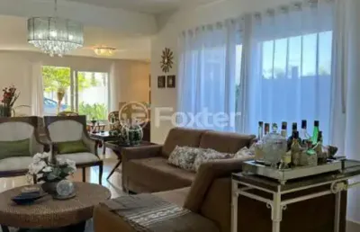 Casa com 5 quartos à venda na avenida central, 2000, zona nova, capão da canoa, 275 m2 por r$ 1.890.000