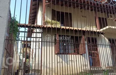 Casa com 3 quartos à venda na avenida doutor petrônio portella, 1415, parque santa fé, porto alegre, 267 m2 por r$ 850.000