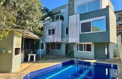 Casa com 4 quartos à venda na rua doutor possidônio cunha, 182, vila assunção, porto alegre, 547 m2 por r$ 5.800.000