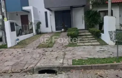 Casa com 3 quartos à venda na rua alexandre de gusmão, 50, hípica, porto alegre, 135 m2 por r$ 699.000