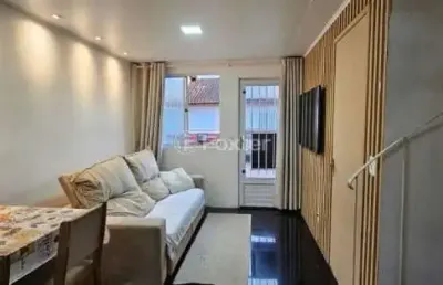 Casa em condomínio fechado com 3 quartos à venda na avenida joão ferreira jardim, 968, parque santa fé, porto alegre, 59 m2 por r$ 212.000