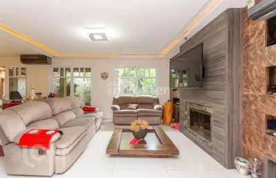 Casa em condomínio fechado com 4 quartos à venda na rua attílio bilibio, 120, jardim carvalho, porto alegre, 446 m2 por r$ 2.399.000