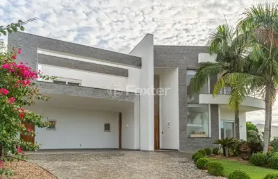 Casa em condomínio fechado com 4 quartos à venda na avenida juca batista, 8000, belém novo, porto alegre, 432 m2 por r$ 2.700.000