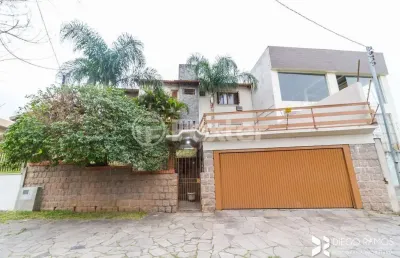 Casa com 4 quartos à venda na avenida da serraria, 742, espírito santo, porto alegre, 284 m2 por r$ 900.000