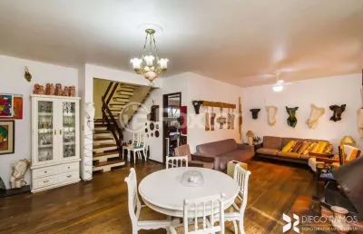 Casa com 4 quartos à venda na avenida otto niemeyer, 3458, cavalhada, porto alegre, 328 m2 por r$ 836.000