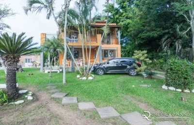 Casa com 3 quartos à venda na estrada francisca de oliveira vieira, 651, belém novo, porto alegre, 290 m2 por r$ 909.150