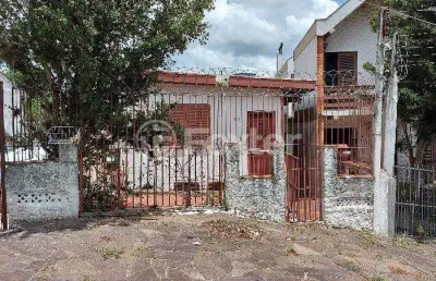 Terreno à venda na rua antônio carlos lopes, 90, medianeira, porto alegre, 297 m2 por r$ 322.000