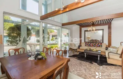 Casa com 5 quartos à venda na avenida orleaes, 270, guarujá, porto alegre, 291 m2 por r$ 860.000