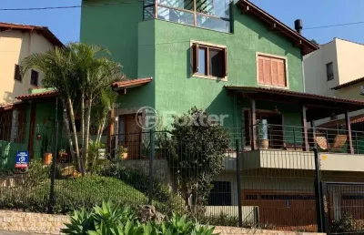 Casa com 4 quartos à venda na rua arachanes, 189, espírito santo, porto alegre, 303 m2 por r$ 1.250.000