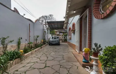 Casa com 3 quartos à venda na rua bernardo guimarães, 148, partenon, porto alegre, 235 m2 por r$ 495.000
