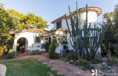 Casa com 4 quartos à venda na avenida guaíba, 684, ipanema, porto alegre, 240 m2 por r$ 2.150.000
