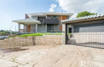 Casa com 3 quartos à venda na rua doutor paulino guerra, 362, jardim itu sabará, porto alegre, 258 m2 por r$ 1.290.000