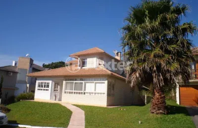 Casa em condomínio fechado com 3 quartos à venda na estrada capitão gentil machado de godoy, 4500, vila elsa, viamão, 240 m2 por r$ 700.000