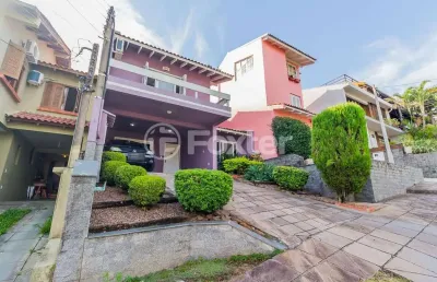 Casa em condomínio fechado com 3 quartos à venda na rua erechim, 100, nonoai, porto alegre, 190 m2 por r$ 730.000