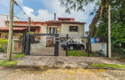 Casa com 3 quartos à venda na rua cassino, 75, ipanema, porto alegre, 379 m2 por r$ 980.000