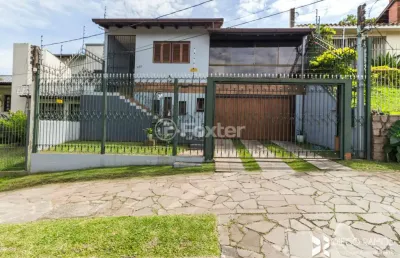 Casa com 3 quartos à venda na rua doutor egydio michaelsen, 250, cavalhada, porto alegre, 292 m2 por r$ 1.385.000