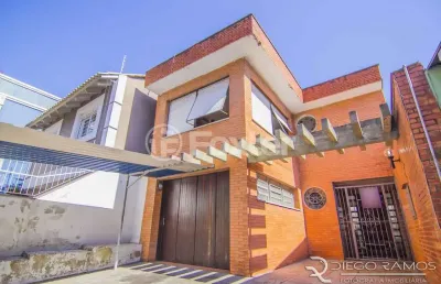 Casa com 4 quartos à venda na rua eudoro berlink, 482, auxiliadora, porto alegre, 214 m2 por r$ 1.700.000