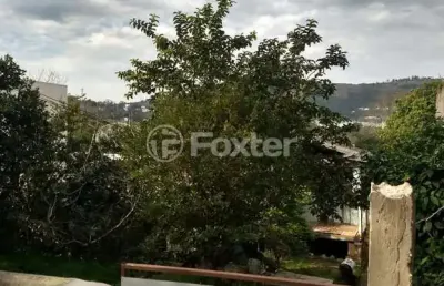 Terreno comercial à venda na avenida mário meneghetti, 505, morro santana, porto alegre, 525 m2 por r$ 405.000