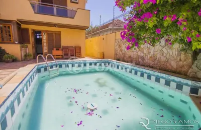 Casa com 4 quartos à venda na rua pinto da rocha, 383, partenon, porto alegre, 420 m2 por r$ 900.000